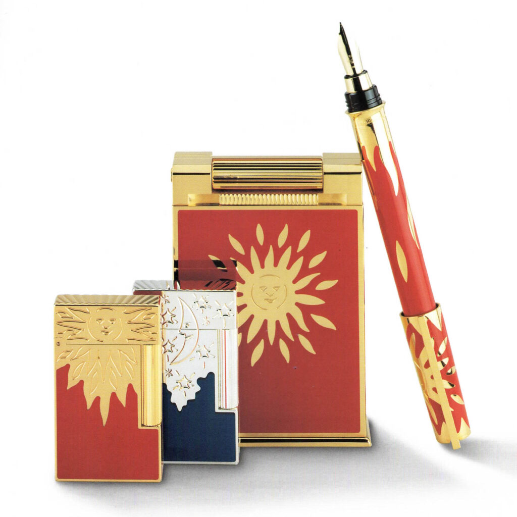 S.T. Dupont Rendez-vous limited edition 1996, sun and moon Ligne 2 lighters with table lighter and pen