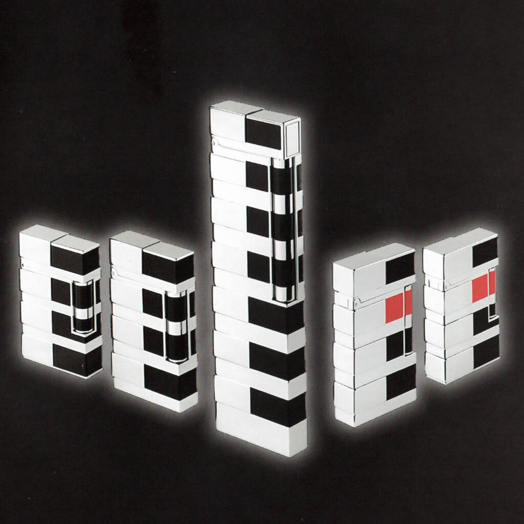 S.T. Dupont Art and Technique limited edition 2003 lighters in black and red lacquer with platinum bands