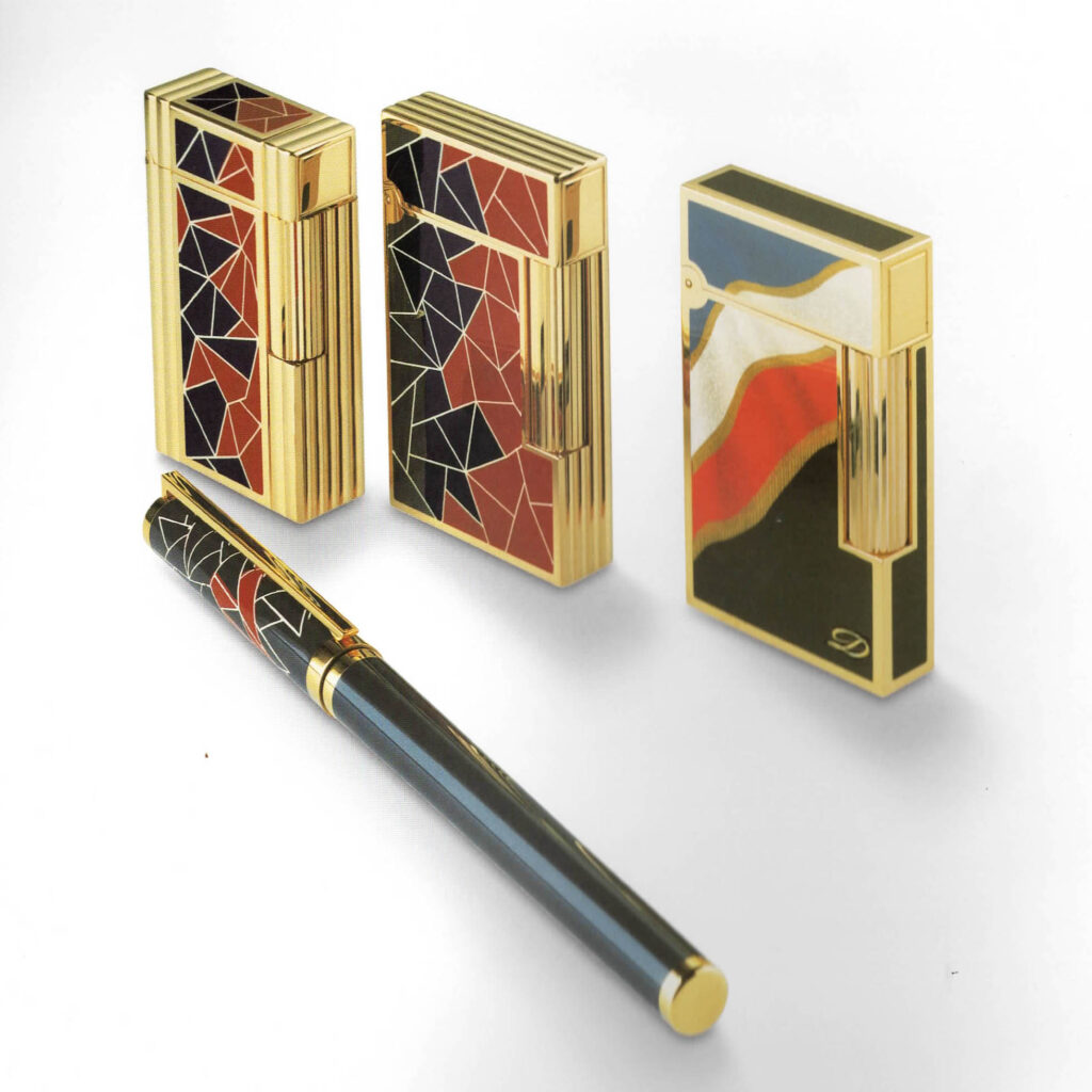 S.T. Dupont Révolution française limited edition 1989 with two mosaic lighters, a tricolour lighter and pen