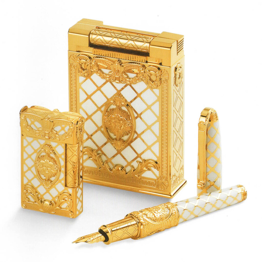 S.T. Dupont Versailles limited edition 2006 in gold with white lacquer, table lighter and pen
